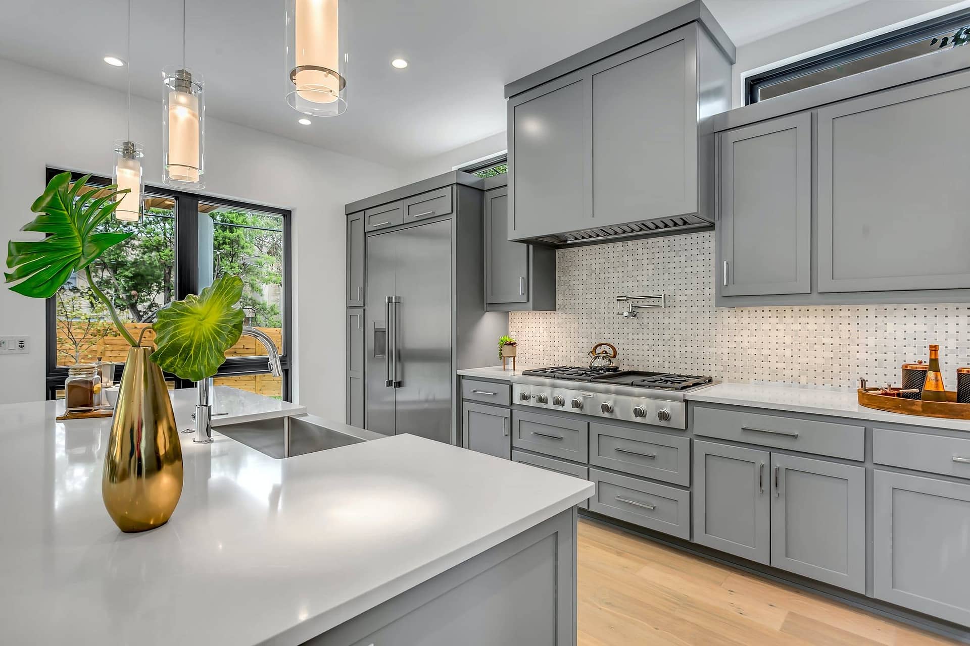 Kitchen remodel in Grey tones with Quartz counters.